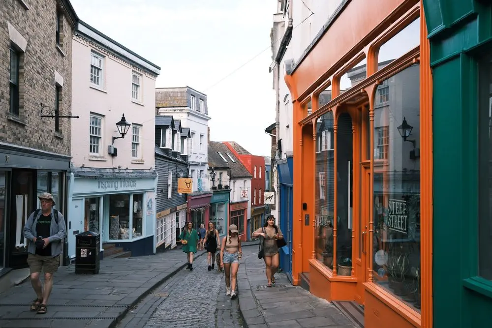 Row of independent shopfronts on a high street